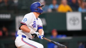 Texas Rangers' Corey Seager flies out during his first plate appearance during the first inning of a baseball game against the Athletics, Monday, Aug. 31, 2026, in Arlington, Texas. (Julio Cortez/AP)