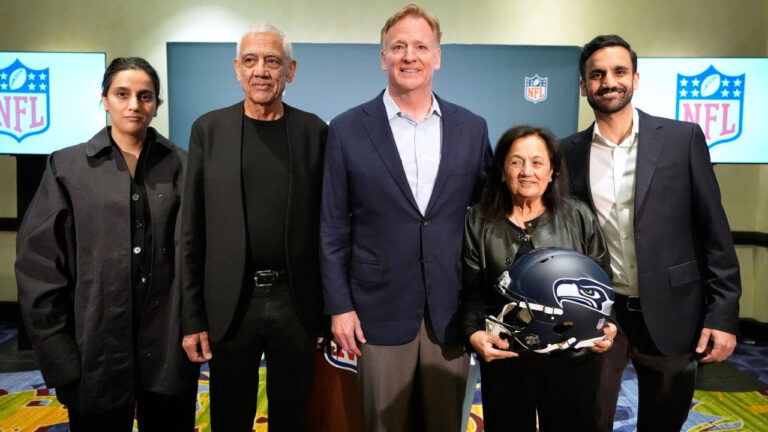 Seattle Seahawks owner's The Khosla family, and NFL commissioner Roger Goodell, Nina Khosla, left, Vinod Khosla, Neeru Khosla, and Neal Khosla pose for a portrait during a news conference at an NFL football owners meeting on Wednesday, Aug. 26, 2026, in Atlanta. (Brynn Anderson/AP)