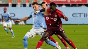 Toronto FC defender Richie Laryea battles for the ball with New York City FC forward Hannes Wolf during the half of an MLS soccer game against, Friday, July 31, 2026, in New York. (Yuki Iwamura/AP)