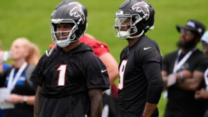 Atlanta Falcons quarterback's Michael Penix Jr. and Tua Tagovailoa move during an NFL practice, Wednesday, May 27, 2026, in Flowery Branch, Ga. (AP/Mike Stewart)