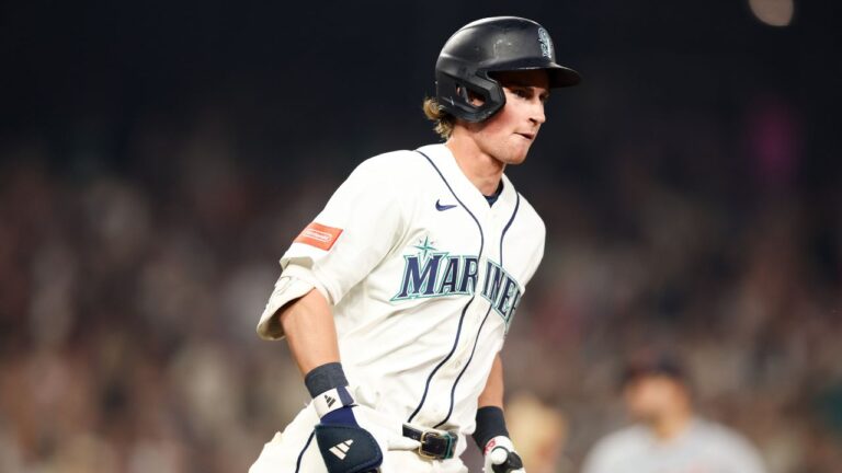 Seattle Mariners' Colt Emerson circles the bases after hitting a home run in the eighth inning of a baseball game against the Detroit Tigers, Wednesday, Aug. 5, 2026, in Seattle. (AP Photo/Kevin Ng)