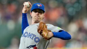 Toronto Blue Jays starting pitcher Shane Bieber throws during the first inning of a baseball game against the Houston Astros Monday, Aug. 3, 2026, in Houston. (AP Photo/David J. Phillip)