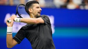 Novak Djokovic, of Serbia, reacts after missing a shot during the first round of the U.S. Open tennis championships against Mariano Navone, of Argentina, Sunday, Aug. 30, 2026, in New York. (AP Photo/Frank Franklin II)