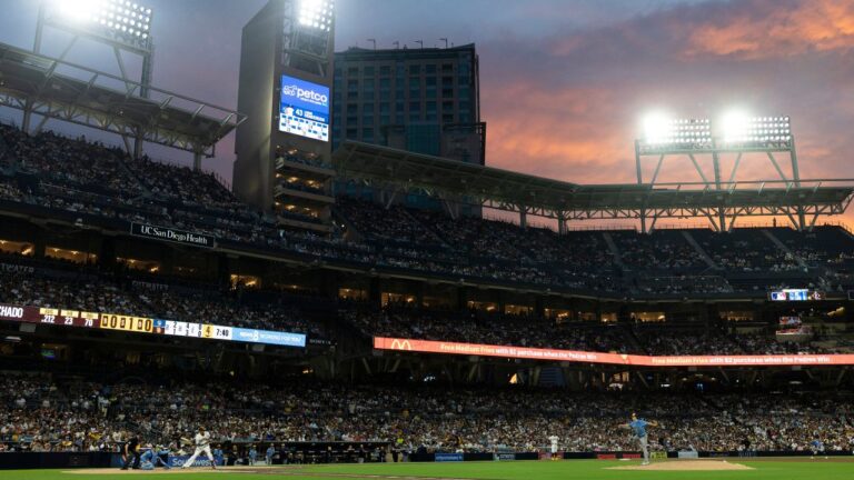 Milwaukee Brewers starting pitcher Logan Henderson, right, works against San Diego Padres' Manny Machado, third from left, in the fourth inning of a game Monday, Aug. 10, 2026, in San Diego. (Karl Anderson/AP)
