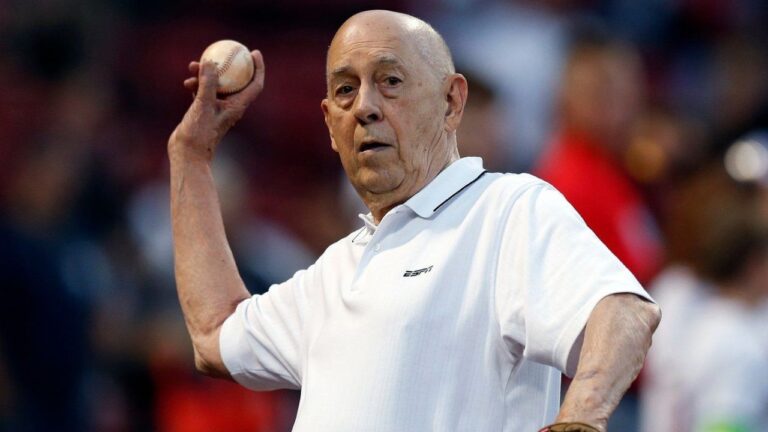 ESPN co-founder Bill Rasmussen tosses a ball before a baseball game between the Boston Red Sox and the New York Yankees in Boston, Sept. 8, 2019. (Michael Dwyer/AP)