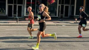 Lauren Barr, 35, from Calgary, centre, runs to her second-place finish among women racers in the Edmonton Marathon on Sunday, Aug. 16, 2026. (Lauren Barr, handout/CP)