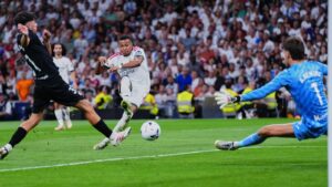 Real Madrid's Kylian Mbappe scores his team's fourth goal during the La Liga match between Real Madrid and Real Sociedad in Madrid, Spain, Wednesday, Aug. 26, 2026. (Manu Fernandez/AP)