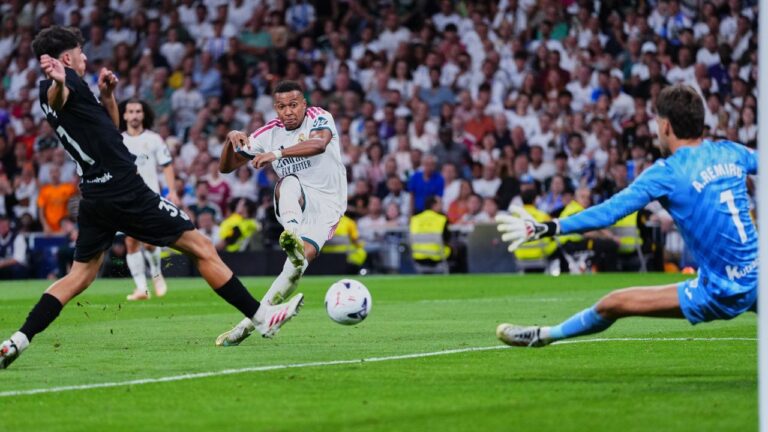 Real Madrid's Kylian Mbappe scores his team's fourth goal during the La Liga match between Real Madrid and Real Sociedad in Madrid, Spain, Wednesday, Aug. 26, 2026. (Manu Fernandez/AP)