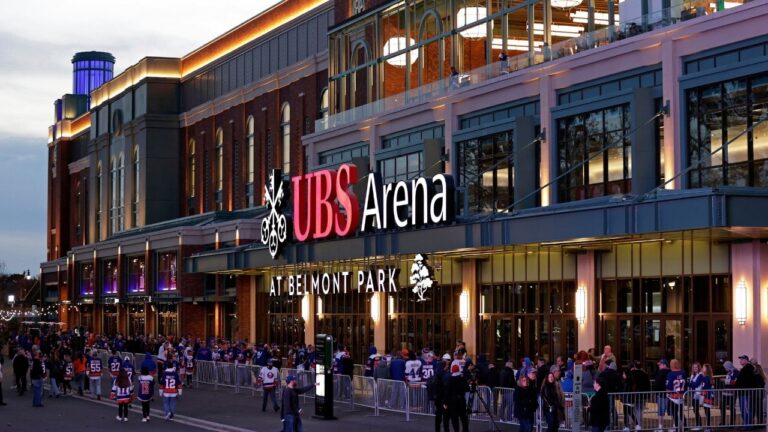 Fans wait to enter the UBS Arena for the first New York Islanders NHL game against the Calgary Flames, Nov. 20, 2021, in Elmont, N.Y. (Adam Hunger/AP)