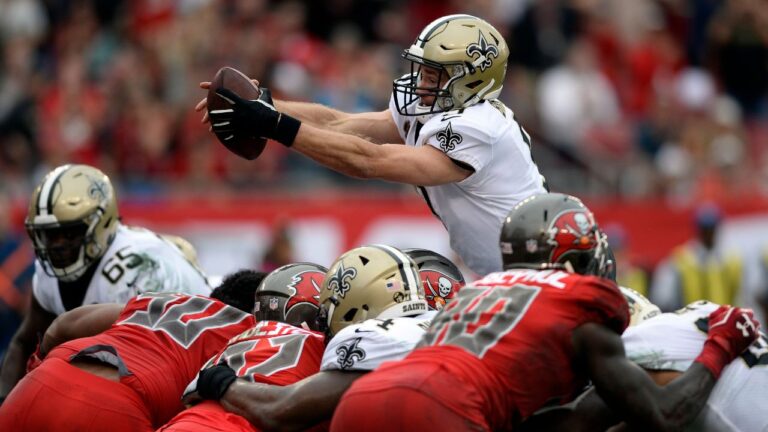 Drew Brees dives over the line on a one-yard touchdown run during an NFL game on Dec. 9, 2018, in Tampa, Fla. (Jason Behnken/AP)