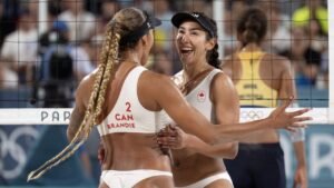 Canada's Melissa Humana-Paredes (right) and Brandie Wilkerson during the beach volleyball final against Brazil's Ana Patricia Silva Ramos and Eduarda Santos Lisboa at the Summer Olympics, on Friday, August 9, 2024 in Paris. (Adrian Wyld/CP)