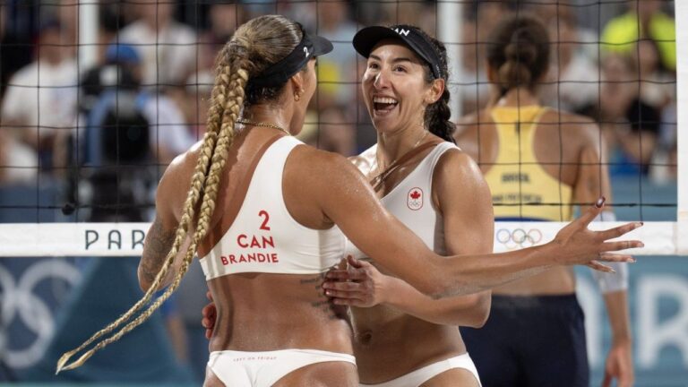 Canada's Melissa Humana-Paredes (right) and Brandie Wilkerson during the beach volleyball final against Brazil's Ana Patricia Silva Ramos and Eduarda Santos Lisboa at the Summer Olympics, on Friday, August 9, 2024 in Paris. (Adrian Wyld/CP)