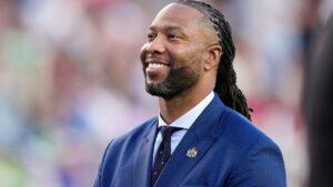 Larry Fitzgerald stands on the field for a tribute during the first half of Super Bowl 60 between the New England Patriots and the Seattle Seahawks, Sunday, Feb. 8, 2026, in Santa Clara, Calif. (Julio Cortez/AP)
