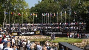 Lucas Herbert of Ripper GC hits from the first tee during LIV Golf United Kingdom presented by JCB at JCB Golf & Country Club on Friday, July 24, 2026 in Rocester, England. (Chris Trotman/AP)