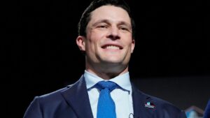 Luke Kuechly smiles after being announced for the Pro Football Hall of Fame class of 2026 in San Francisco, Thursday, Feb. 5, 2026. (Brynn Anderson/AP)