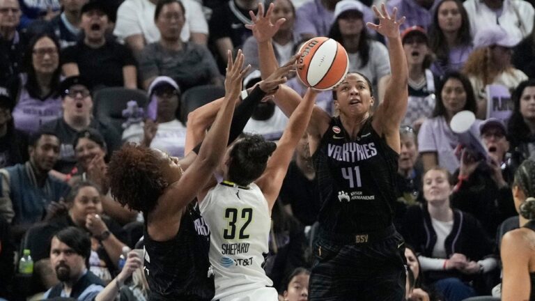 Golden State Valkyries forward Kayla Thornton, left, blocks a shot by Dallas Wings forward Jessica Shepard (32) and centre Kiah Stokes (41) defends during the first half of a WNBA basketball game in San Francisco, Monday, Aug. 17, 2026. (Jeff Chiu/AP)