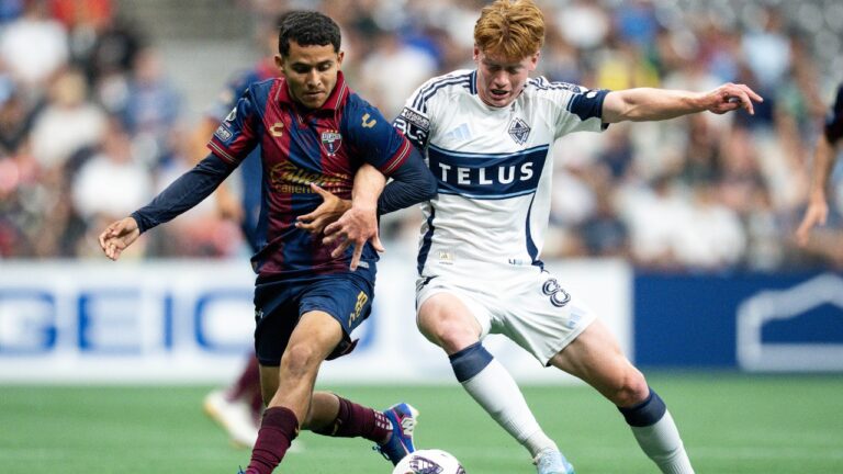 Atlante FC's Luis Calzadilla, left, and Vancouver Whitecaps' Oliver Larraz (8) vie for the ball during the first half of a Leagues Cup soccer match in Vancouver, on Tuesday, August 4, 2026. (Ethan Cairns/CP)
