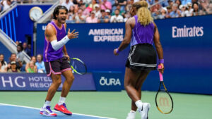 Carlos Alcaraz, of Spain, left, and Serena Williams, of the United States, react during a mixed doubles match at the U.S. Open tennis championships, Tuesday, Aug. 25, 2026, in New York. (Yuki Iwamura/AP)