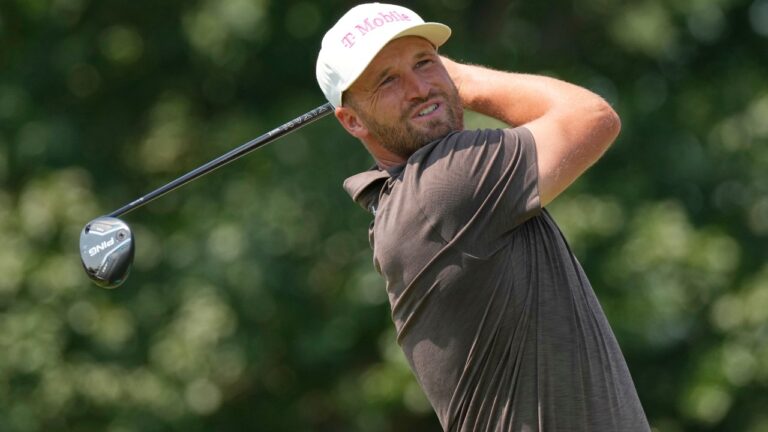 Wyndham Clark hits from the fifth tee during the third round of the BMW Championship golf tournament Saturday, Aug. 22, 2026, in St. Louis. (AP Photo/Jeff Roberson)
