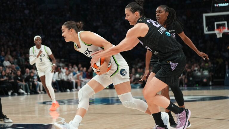 Minnesota Lynx guard Eliska Joklova, front left, works toward the basket as Golden State Valkyries forward Cecilia Zandalasini, front right, defends during the first half of a WNBA basketball game Monday, Aug. 24, 2026, in Minneapolis. (Abbie Parr/AP)