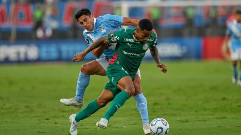 Allan of Brazil's Palmeiras, right, and Irven Avila of Peru's Sporting Cristal battle for the ball during a Copa Libertadores Group F soccer match in Lima, Peru, Tuesday, May 5, 2026. (Martin Mejia/AP)