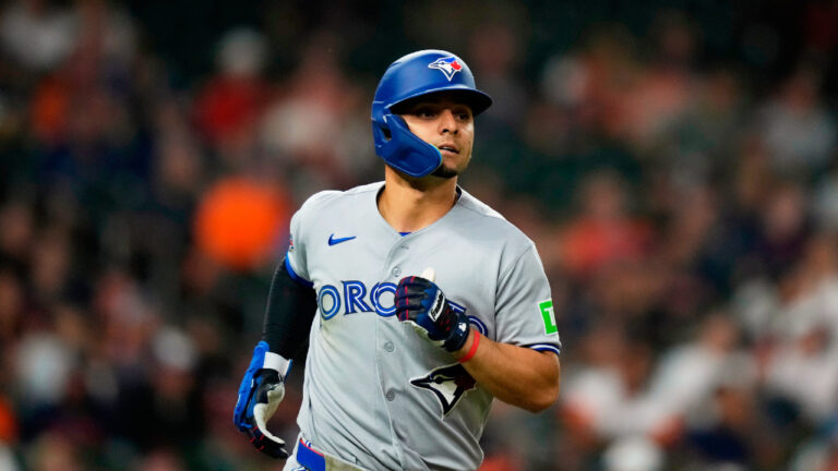 Toronto Blue Jays' Andres Gimenez runs up the first base line during a baseball game Tuesday, Aug. 4, 2026, in Houston. (David J. Phillip)