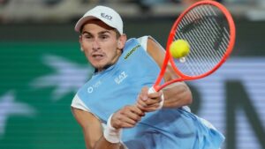 Italy's Matteo Arnaldi returns to Italy's Matteo Berrettini during the quarterfinal tennis match at the French Open in Paris, Wednesday, June 3, 2026. (Christophe Ena/AP Photo)