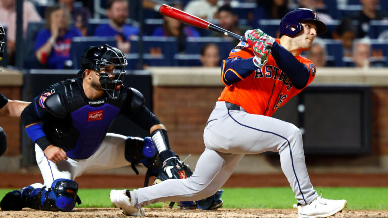 Houston Astros' Daulton Varsho, right, follows through on an RBI single against the New York Mets during the sixth inning of a baseball game, Friday, Aug. 28, 2026, in New York. (Noah K. Murray/AP)