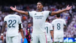 Real Madrid's Jude Bellingham celebrates after Malaga's own goal during the La Liga soccer match between Real Madrid and Malaga in Madrid, Spain, Sunday, Aug. 30, 2026. (Manu Fernandez/AP)