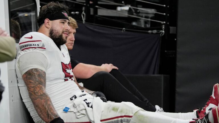 Injured Arizona Cardinals offensive lineman Chase Bisontis is carted off the field during the second half of a preseason NFL football game against the Las Vegas Raiders, Thursday, Aug. 13, 2026, in Las Vegas. (John Locher/AP)
