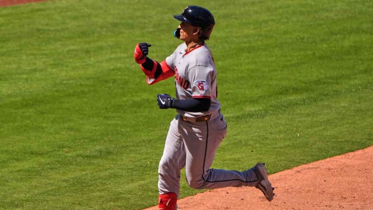Cleveland Guardians' Bo Naylo celebrates as he runs the bases after hitting a three-run home run during the seventh inning of a baseball game against the Kansas City Royals. (Charlie Riedel/AP)