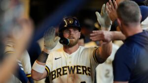 Milwaukee Brewers' Jake Bauers is congratulated in the dugout after hitting a two-run home run during the sixth inning of a baseball game against the Seattle Mariners, Tuesday, Aug. 18, 2026, in Milwaukee. (Aaron Gash/AP Photo)
