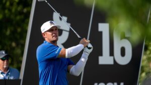 Captain Bryson DeChambeau of Crushers GC hits his shot from the 16th tee during the first round of LIV Golf Bedminster at Trump National Golf Club on Thursday, August 06, 2026 in Bedminster, New Jersey. (Photo by Montana Pritchard/LIV Golf)