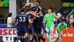 Vancouver Whitecaps forward Thomas Muller (13) second from left, celebrates scoring against the Seattle Sounders during the second half of an MLS soccer match, Sunday, Aug. 16, 2026, in Seattle. (Lindsey Wasson/AP)