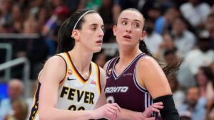 Indiana Fever's Caitlin Clark (22) moves past Toronto Tempo's Marina Mabrey (3) during second half WNBA basketball action in Toronto on Tuesday, August 18, 2026. (Chris Young/THE CANADIAN PRESS)