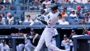 New York Yankees' Cody Bellinger hits a single in the first inning during a baseball game against the Boston Red Sox, Sunday, Aug. 30, 2026, in New York. (Corey Sipkin/AP)
