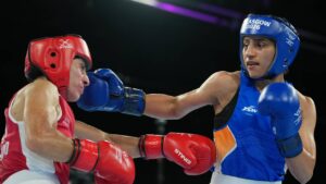 India’s Preeti Preeti, right, and Canada’s Scarlett Savannah Delgado compete in the women's 54kg boxing final at the Commonwealth Games in Glasgow, Scotland, Saturday, Aug. 1, 2026. (Eranga Jayawardena/AP)