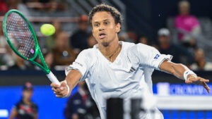Gabriel Diallo of Canada plays a shot to Kyrian Jacquet of France during their first round match at the National Bank Open tennis tournament in Montreal, Monday, Aug. 3, 2026. (Graham Hughes/AP)