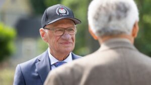 Canadian Baseball Hall of Fame inductee Jacques Doucet, left, shares a moment with 2023 inductee Joe Wiwchar in St. Marys, Ont., on Saturday, June 17, 2023. (Nicole Osborne/THE CANADIAN PRESS)