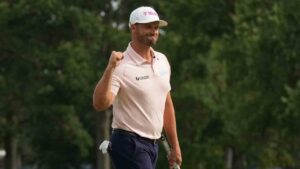 Wyndham Clark celebrates winning on the 18th green in the final round of the BMW Championship golf tournament, Sunday, Aug. 23, 2026, in St. Louis. (Jeff Roberson/AP)