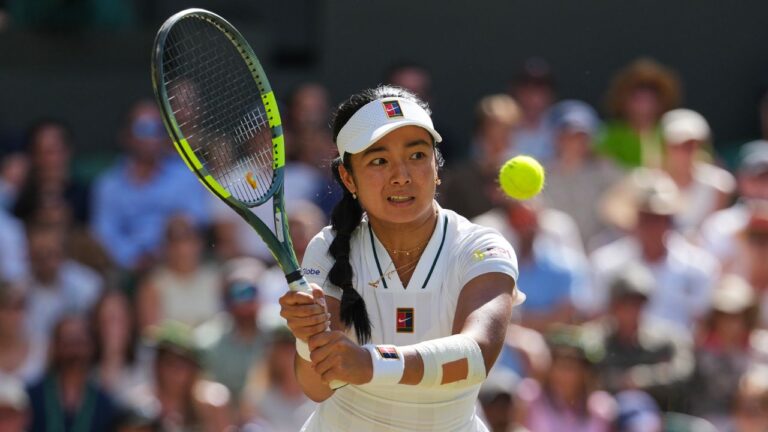 Alexandra Eala of the Philippines plays a return during the women's singles fourth round match against Jasmine Paolini of Italy at the Wimbledon Tennis Championships in London, Monday, July 6, 2026. (Kirsty Wigglesworth/AP Photo)