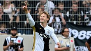Elversberg's Cole Campbell celebrates after scoring during a Bundesliga soccer match between Elversberg and Bayer Leverkusen, in Spiesen-Elversberg, Germany, Saturday, Aug. 29, 2026. (Harald Tittel/dpa via AP)