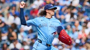 Toronto Blue Jays' Kevin Gausman (34) works against the St. Louis Cardinals during first inning MLB baseball action in Toronto, on Saturday, Aug. 1, 2026. (Sammy Kogan/THE CANADIAN PRESS)