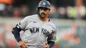 New York Yankees' Trent Grisham rounds the bases after hitting a home run during the third inning of a baseball game against the Baltimore Orioles, Tuesday, Aug. 18, 2026, in Baltimore. (Stephanie Scarbrough/AP Photo)