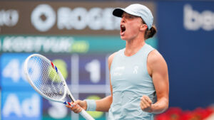 Iga Swiatek of Poland celebrates her 3-6, 6-1, 6-2, win over Marta Kostyuk of Ukraine during round of 16 National Bank Open tennis action in Toronto, on Saturday, Aug. 8, 2026. (Keito Newman/CP)