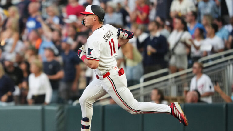 Minnesota Twins' Walker Jenkins rounds first base on his major league debut during the second inning of a baseball game against the Chicago White Sox, Friday, Aug. 28, 2026, in Minneapolis. (Ellen Schmidt/AP)
