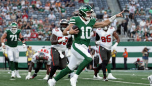 New York Jets quarterback Cade Klubnik (10) runs with the ball during an NFL preseason football game against the Tampa Bay Buccaneers in East Rutherford, N.J., Friday, Aug. 14, 2026. (Adam Hunger/AP)