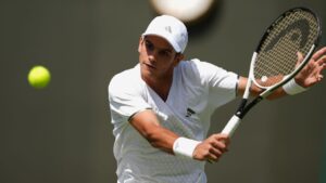 Rafael Jodar of Spain plays a volley against Felix Gill of Britain in their first round men's singles match at the Wimbledon Tennis Championships in London, Monday, June 29, 2026. (Maja Smiejkowska/AP Photo)