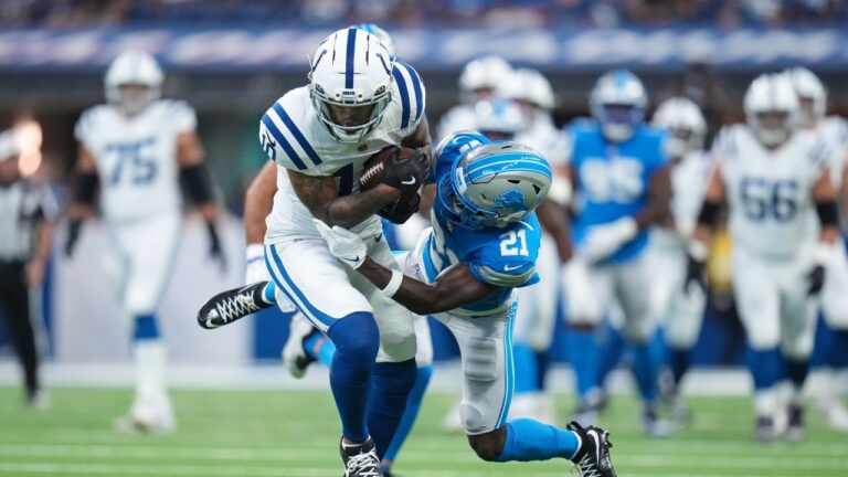 Indianapolis Colts wide receiver Keenan Allen (10) is tackled by Detroit Lions cornerback Roger McCreary (21) during the first half of a preseason NFL football game in Indianapolis, Saturday, Aug. 29, 2026. (Jeff Roberson/AP)