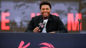 Kyle Lowry speaks at a press conference as he signs a one-day contract to retire as a Toronto Raptor, in Toronto, on Tuesday, July 7, 2026. (Chris Young/CP)